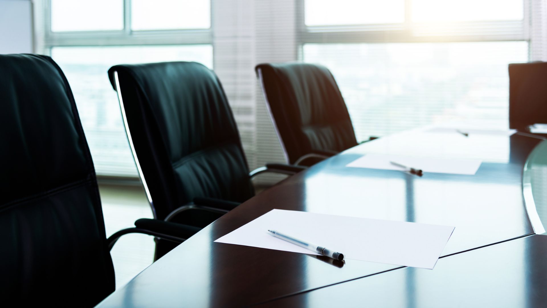  Chairs around a board table